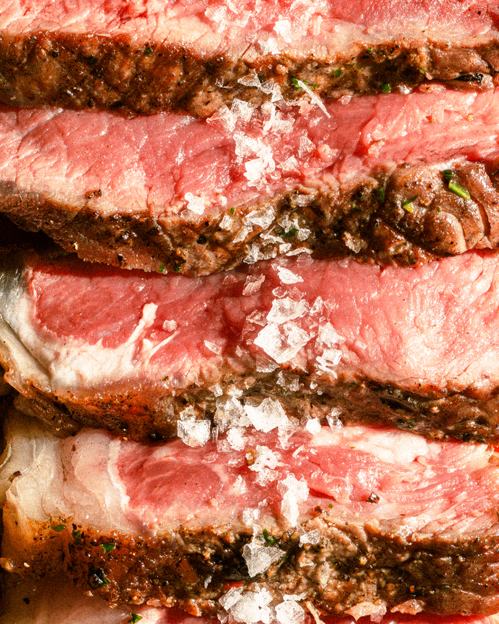 Close-up of sliced steak with sea salt